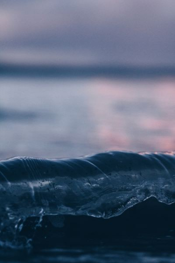 shallow focus photography of water wave shallow focus photography of water wave