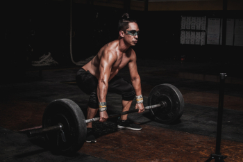 Shirtless Man Lifting Barbell Shirtless Man Lifting Barbell