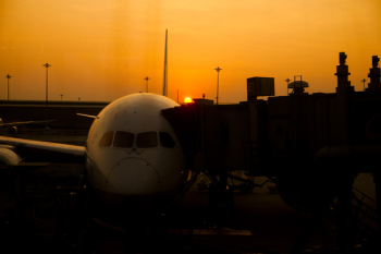 Silhouette of Airplane on Airport during Sunset