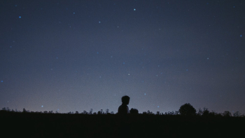 Silhouette of Boy Under Black Sky Silhouette of Boy Under Black Sky