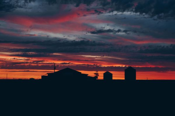 silhouette of house during sunset silhouette of house during sunset