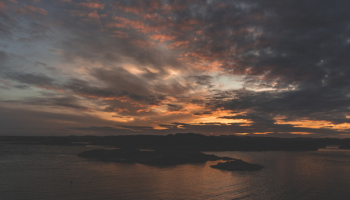 Silhouette of Island during Sunset Silhouette of Island during Sunset