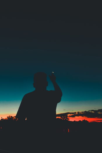 Silhouette Of Man Pointing Moon Silhouette Of Man Pointing Moon
