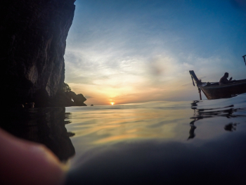 Silhouette of Man Riding Boat Silhouette of Man Riding Boat