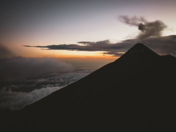 silhouette of mountain with clouds silhouette of mountain with clouds