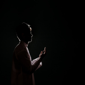 Silhouette of muslim man praying Silhouette of muslim man praying