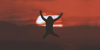 silhouette of person doing jumpshot during sunset silhouette of person doing jumpshot during sunset