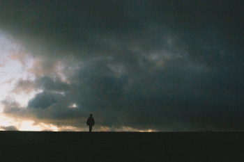 Silhouette of Person Standing Silhouette of Person Standing