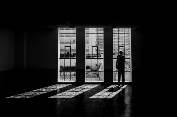 Silhouette Of Person Standing Facing Window Silhouette Of Person Standing Facing Window
