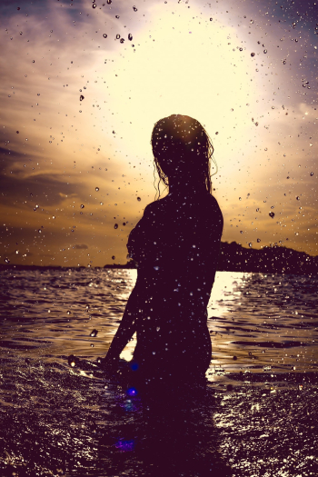Silhouette of Woman in Water Silhouette of Woman in Water