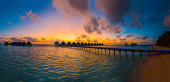 Silhouette Photography of In-lined Cottages in Sea Silhouette Photography of In-lined Cottages in Sea