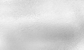 Silver background from metal foil on cardboard decorative texture