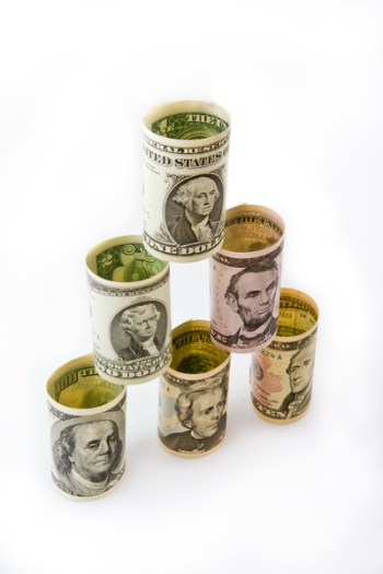 Six Assorted Rolled Us Dollar Banknotes