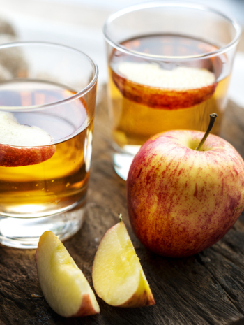 Sliced Apple Beside Two Apple Juice Sliced Apple Beside Two Apple Juice