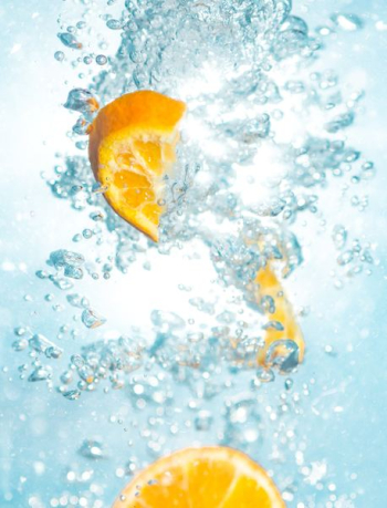 sliced orange fruits underwater sliced orange fruits underwater
