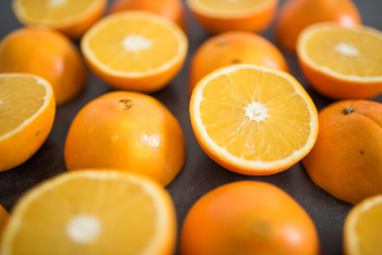 Sliced Oranges on Table