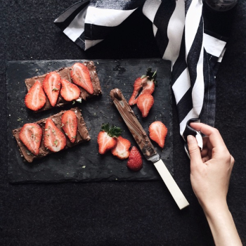 Slices Strawberries on Chopping Board Slices Strawberries on Chopping Board
