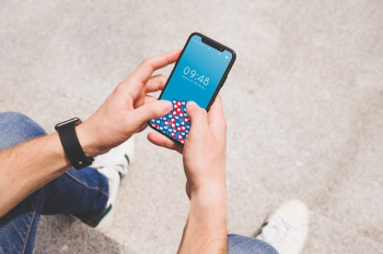 Smartphone mockup with person using it Smartphone mockup with person using it