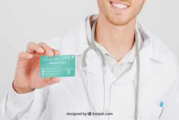 Smiley doctor with mock up of visit card