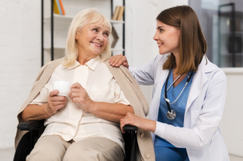 Smiley old woman talking to caregiver Free Photo Smiley old woman talking to caregiver Free Photo
