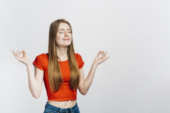 Smiley woman meditating with copy space Free Photo Smiley woman meditating with copy space Free Photo