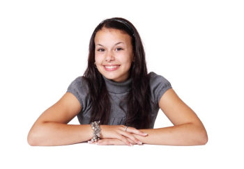 Smiling Brunette Girl in Gray Smiling Brunette Girl in Gray