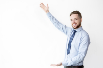 Smiling Business Man Showing Copyspace Smiling Business Man Showing Copyspace