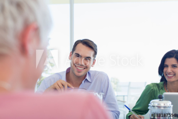 Smiling business people in meeting Smiling business people in meeting