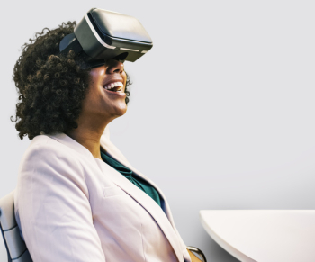 Smiling Woman Wearing Black Virtual Reality Headset Smiling Woman Wearing Black Virtual Reality Headset