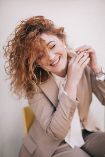 Smiling Woman Wearing Blazer Smiling Woman Wearing Blazer
