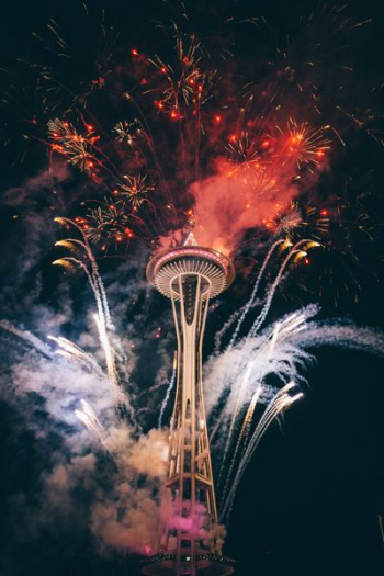 Space Needle, Seattle surrounded by fireworks Space Needle, Seattle surrounded by fireworks