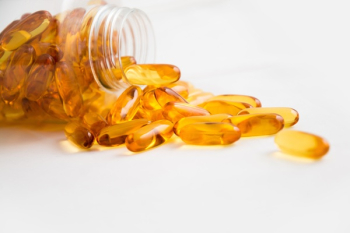 Spilled Bottle of Yellow Capsule Pills Spilled Bottle of Yellow Capsule Pills