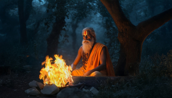 Spiritual Sage Meditating by a Campfire in a Mystical Forest Spiritual Sage Meditating by a Campfire in a Mystical Forest