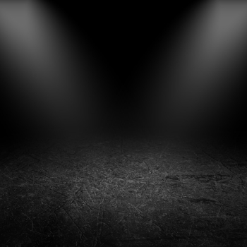 spotlights shining down into a grunge interior