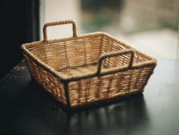 Square Brown Wicker Basket on Table Square Brown Wicker Basket on Table