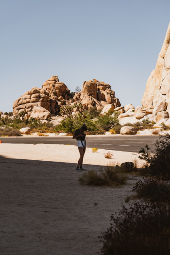 Standing Woman Wearing White Shorts Standing Woman Wearing White Shorts