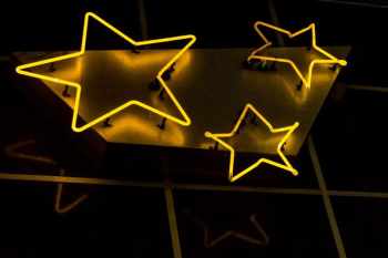 stars neon decorations during nighttime stars neon decorations during nighttime