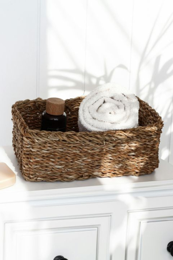 Stylish Woven Basket with Towels and Spa Products Stylish Woven Basket with Towels and Spa Products