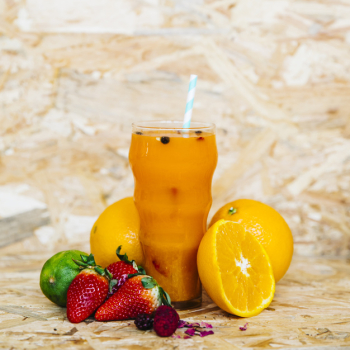 Summer cocktail and tropical fruits