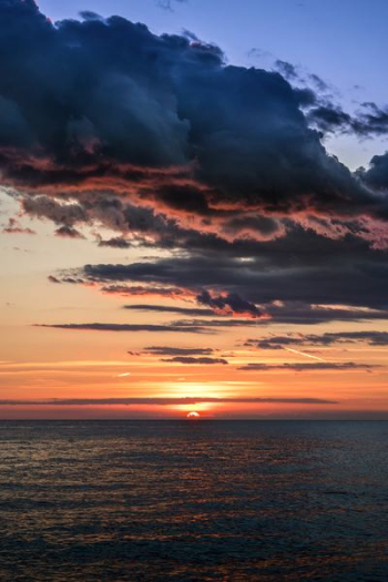 sunset by the sea during golden hour sunset by the sea during golden hour