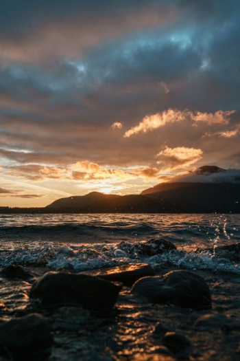 Sunset On Rocky Beach