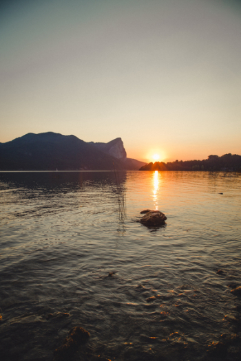 Sunset over Body of Water Sunset over Body of Water