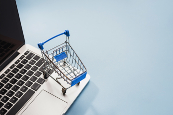 Supermarket cart on laptop Supermarket cart on laptop