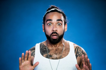 Surprised Tattooed Young Man