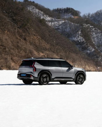 SUV on Snowy Landscape SUV on Snowy Landscape