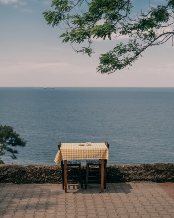 Tablecloth and the Table for 2 Nearby the Sea · Free Stock Photo Tablecloth and the Table for 2 Nearby the Sea · Free Stock Photo