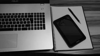 Tablet Computer Beside Laptop Computer