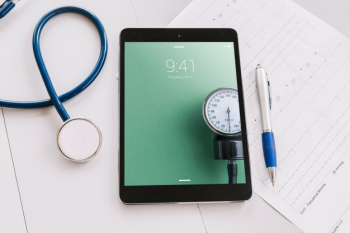 Tablet mockup with medical elements Free Psd