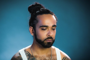 Tattood Man Looking Sad Tattood Man Looking Sad