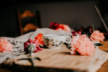 Teacup Beside Flowers Teacup Beside Flowers